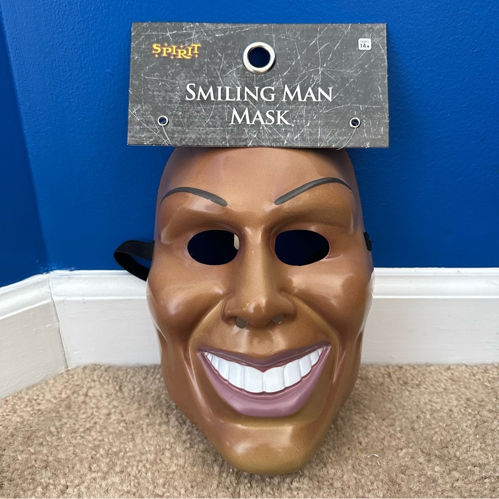 Spirit Halloween Smiling Man Mask New
